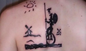 Picasso-inspired tattoo of Don Quixote riding unicycle